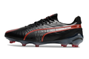 Chuteirta Campo Puma King Ultimate FG Preta e Vermelha "Launch Edition Pack"