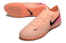 Chuteira Society Nike Phantom GX 2 Elite TF Rosa e Preto "Prism Pack'