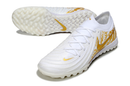 Chuteira Society Nike Phantom GX 2 Elite TF Branco e Dourado