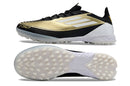 Chuteira Infantil Society Adidas F50 TF Dourada e Preta "Triunfo Dorado Pack"