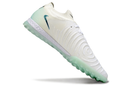 Chuteira Society Nike Phantom GX 2 Elite TF Branca e Verde "Chromatic"