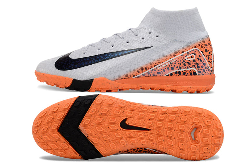 Chuteira Infantil Society Nike Air Zoom Mercurial Superfly 10 Elite TF Branca, Laranja e Preto "Eletric Pack"