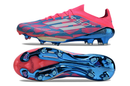 Chuteira Campo Adidas F50+ FG Rosa, Azul e Branca "Reemergence Pack"