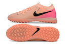Chuteira Society Nike Phantom GX 2 Elite TF Rosa e Preto "Prism Pack'