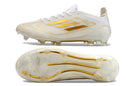 Chuteira Campo Adidas F50 FG Branca e Dourada "Day Spark Pack"
