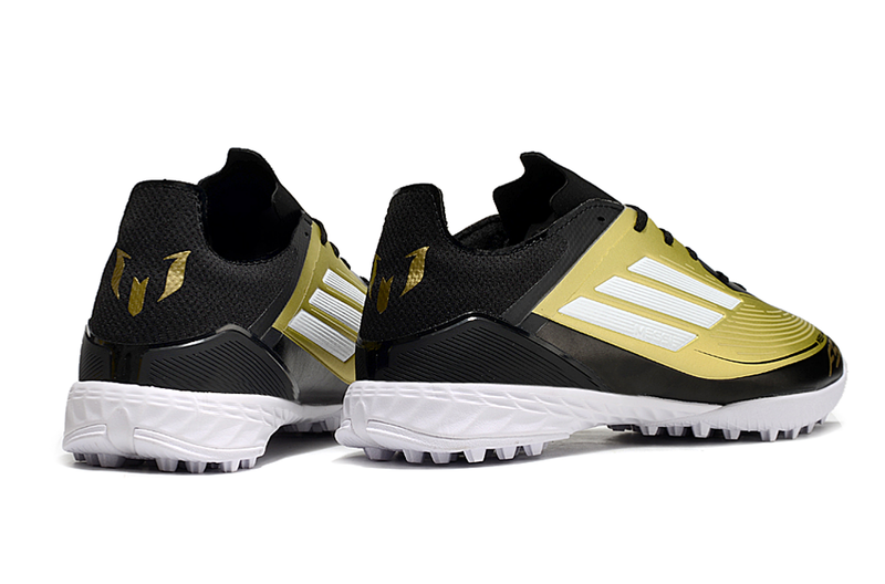 Chuteira Society Adidas F50 Messi TF Preto e Dourado "Triunfo Dorado Pack"