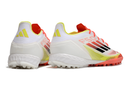 Chuteira Society Adidas F50 TF Branca, Laranja e Amarelo
