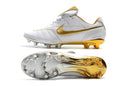 Chuteira Campo Nike Retrô Tiempo Legend 7 Elite FG Branca e Dourada R10