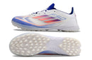 Chuteira Infantil Society Adidas F50 TF Branca, Azul e Vermelha "Advancement Pack"