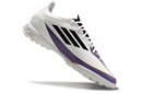 Chuteira Society Adidas F50 TF Branca, Roxa e Preta "Triunfo Estelar"