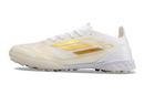 Chuteira Infantil Society Adidas F50 TF Branca e Dourada "Day Spark Pack"
