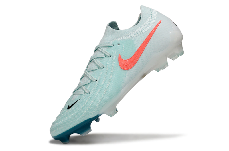 Chuteira Campo Nike Phantom GX 2 Elite FG Branca, Verde e Laranja "Mad Energy"