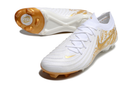 Chuteira Campo Nike Phantom GX 2 Elite FG Branca e Dourada